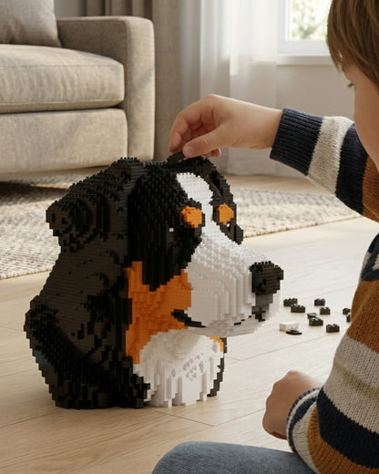 kid building a bernese bust with building blocks