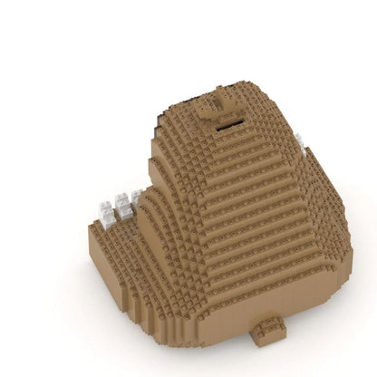 Toy figure of a sloth made from interlocking bricks on a white background