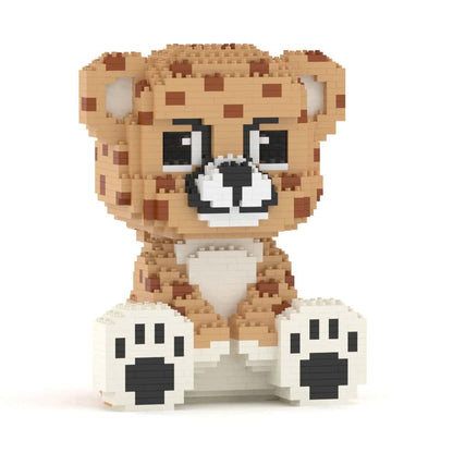 Toy figure of a cheetah made from interlocking bricks on a white background
