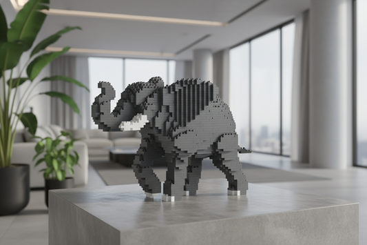 Gray elephant sculpture made of building blocks on a modern office desk with large windows in the background