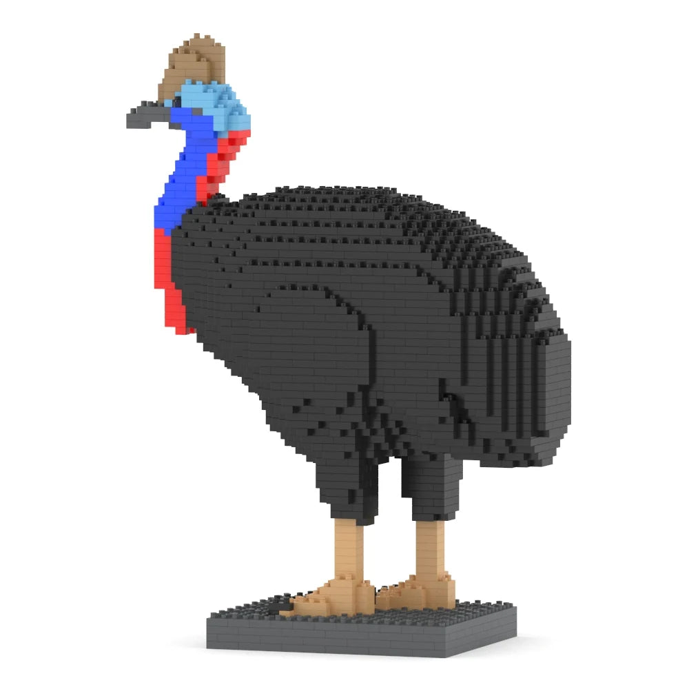 A block-built model of a cassowary bird standing on a gray base, constructed with black, blue, red, brown, and beige bricks against a plain white background.