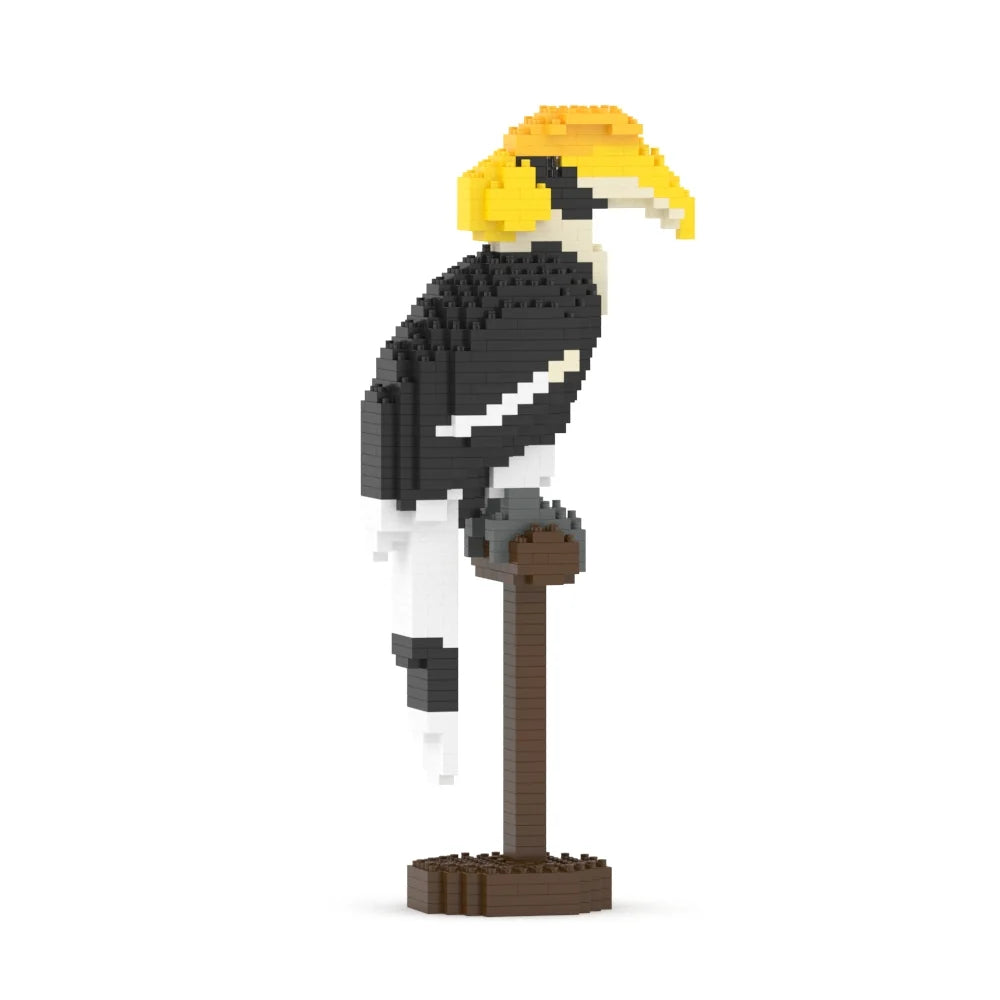 Great hornbill bird figurine built from interlocking square blocks, perched on a brown stand against a plain white background.