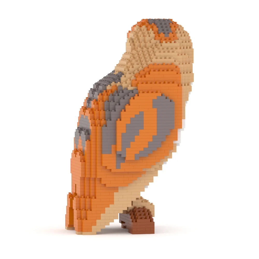Toy owl made of interlocking bricks on a white background