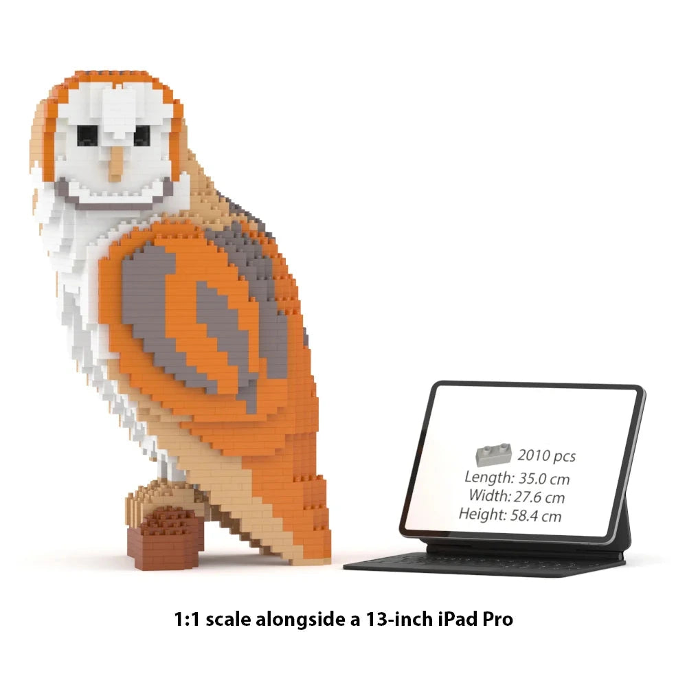 A 1:1 scale owl block building model shown next to a 13-inch iPad Pro displaying its specifications. The owl is constructed from orange, white, and gray interlocking blocks and stands on a small brown acorn.