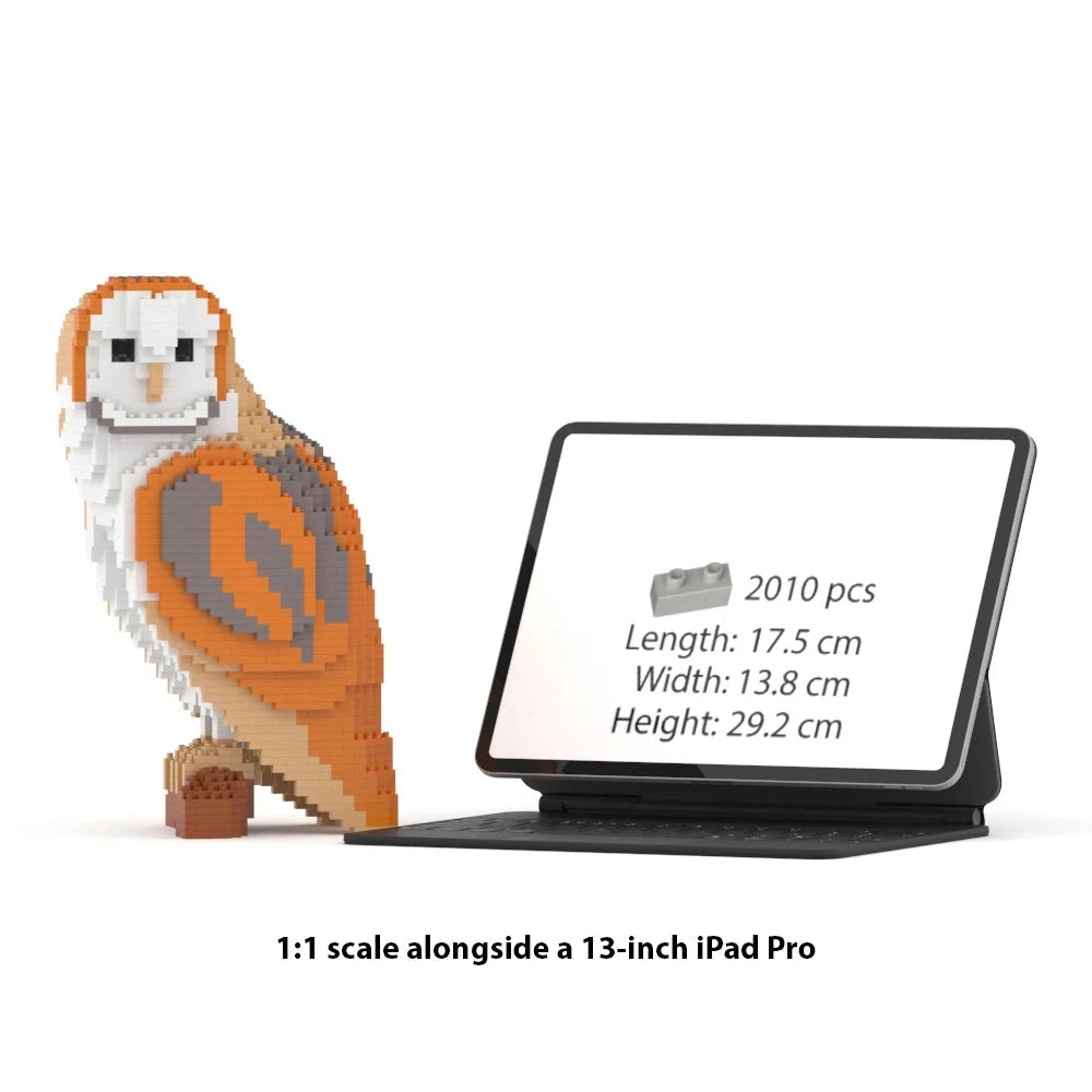 Brick owl model made of building blocks next to a 13-inch iPad Pro on a white background
