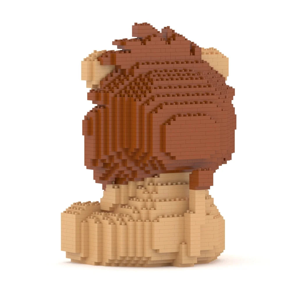 A 3D block puzzle model of a lion, constructed with brown and beige interlocking blocks, shown from a three-quarters perspective on a solid white background.