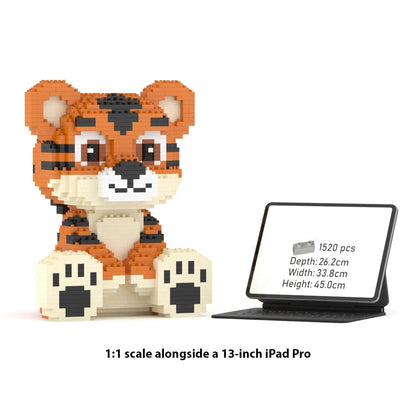 A 1:1 scale toy brick set of a tiger, shown next to a tablet displaying product specifications. The text at the bottom reads '1:1 scale alongside a 13-inch iPad Pro'.