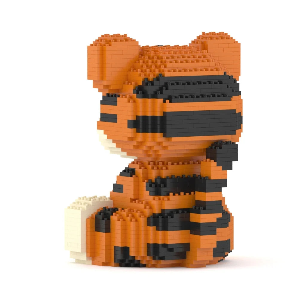 A stylized block-built tiger figurine in orange and black, with a cream-colored tail, shown on a plain white background.