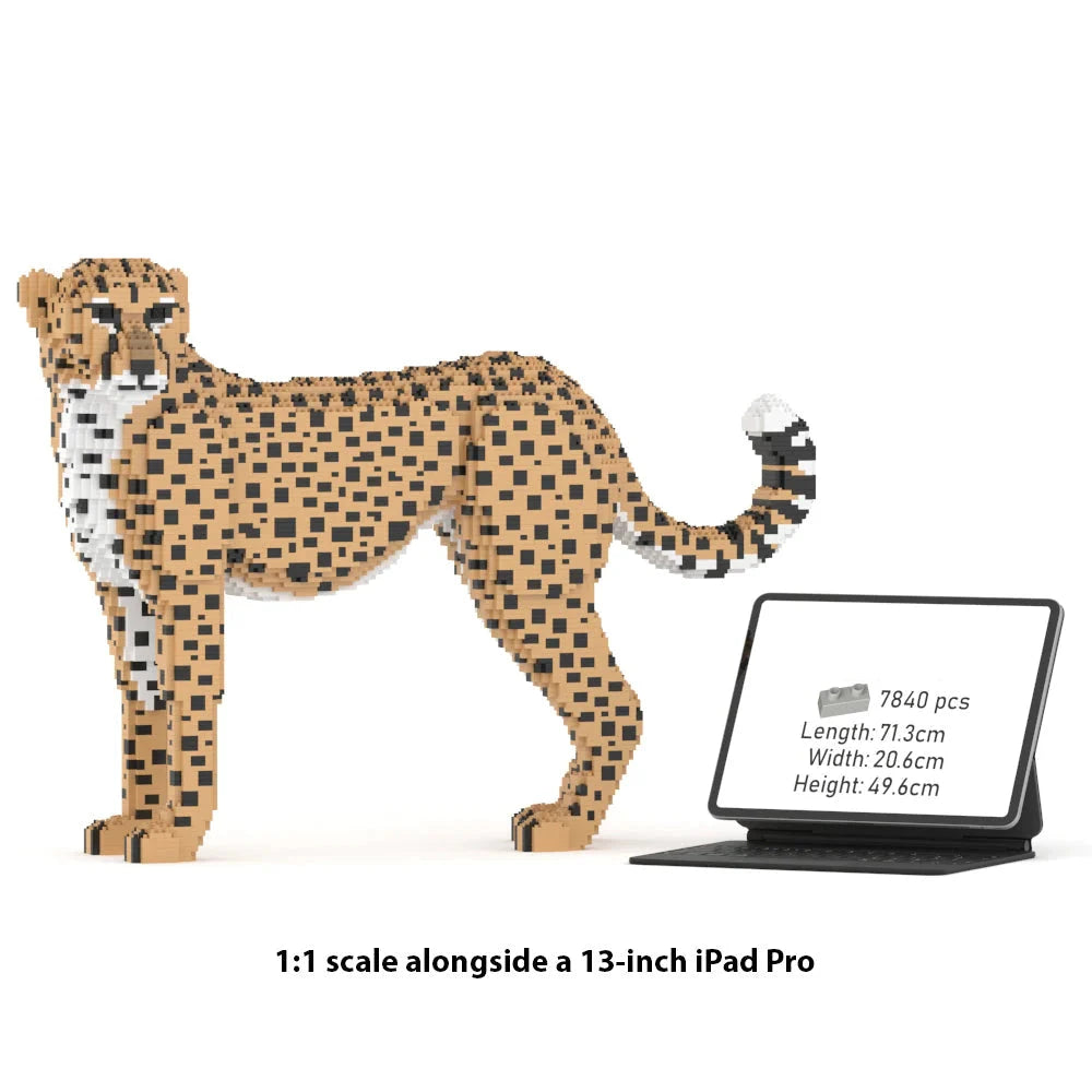 Cheetah figurine next to a 13-inch iPad Pro for scale comparison on a white background