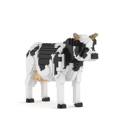 A small cow-shaped building block toy made of black, white, and tan plastic pieces, shown in profile on a clean white background.