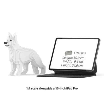 JEKCA German Shepherd 1:1 scale building block sculpture standing next to a 13-inch iPad Pro for size reference.