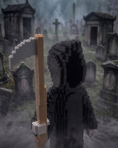 A LEGO-style grim reaper figure in a black hooded robe holding a large scythe, standing in a foggy graveyard with tombstones and crosses in the background.