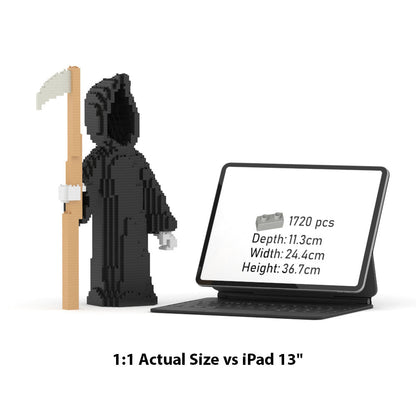 A black brick-built grim reaper figure holding a scythe stands beside a tablet displaying product details. Text below reads '1:1 Actual Size vs iPad 13"'.