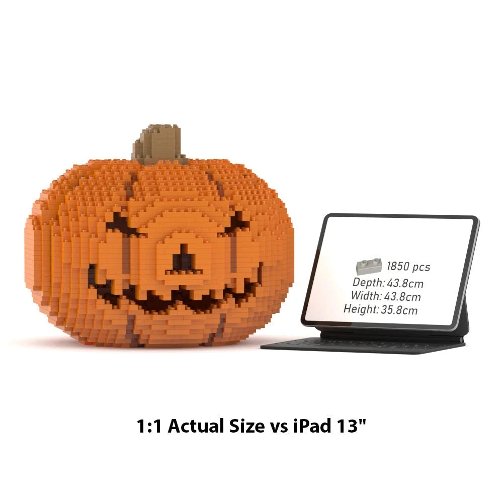 A brick-built jack-o'-lantern pumpkin shown next to a tablet displaying its dimensions and piece count. The text at the bottom reads '1:1 Actual Size vs iPad 13"'.