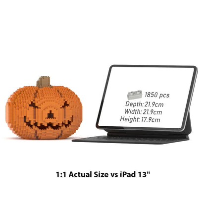 A 1:1 scale model of a Jack-o'-lantern built from orange brick-like blocks, shown next to a tablet displaying product specs. Text below reads '1:1 Actual Size vs iPad 13"'.