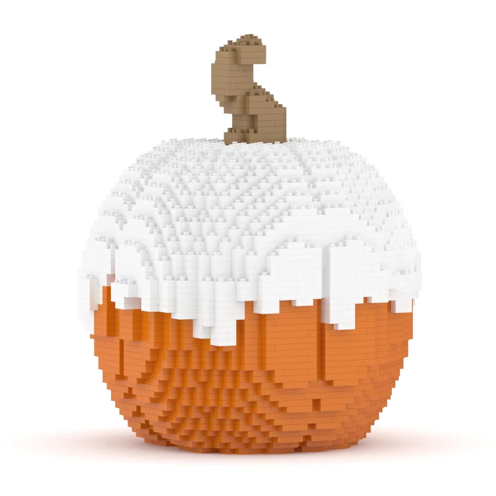 A block-built decorative pumpkin sculpture with an orange lower body, white upper section, and a small brown stem, shown on a plain white background.
