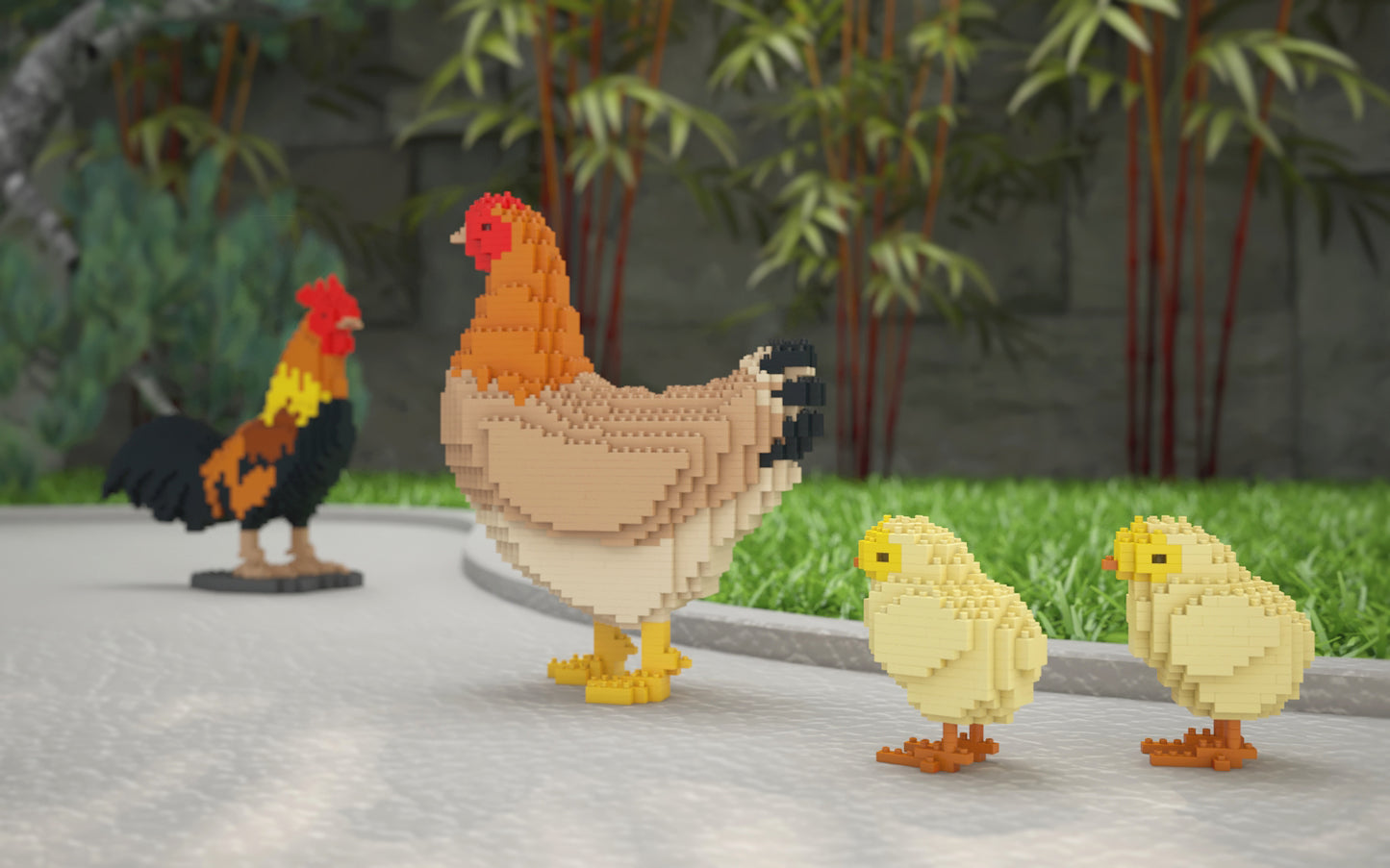 Three block-built toy animals resembling a rooster, hen, and two chicks standing on a gray path with green grass and bamboo in the background.