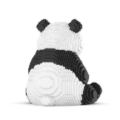 Sitting panda made of interlocking bricks on a white background, view from behind