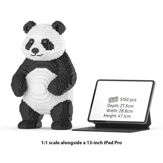 Panda money bank standing near thte 13-inch ipad pro