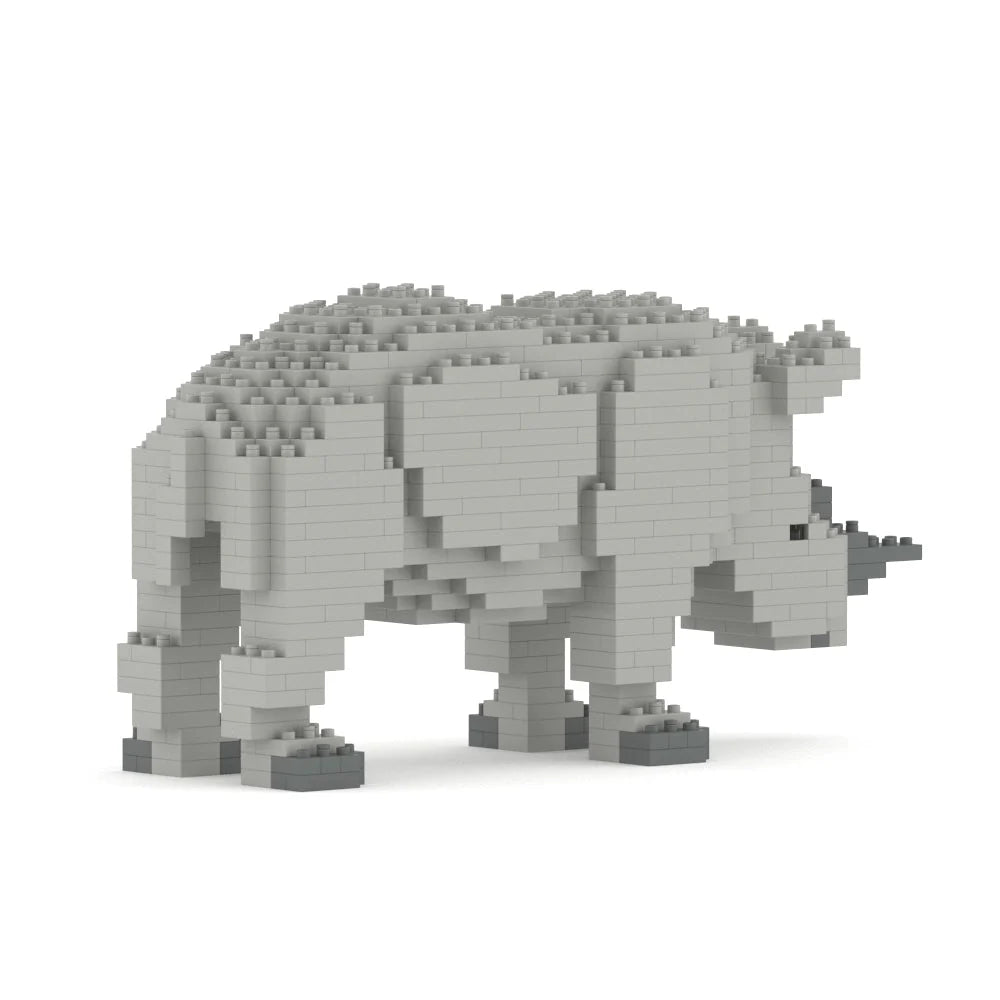 Gray rhino sculpture made of interlocking bricks on a white background facing away