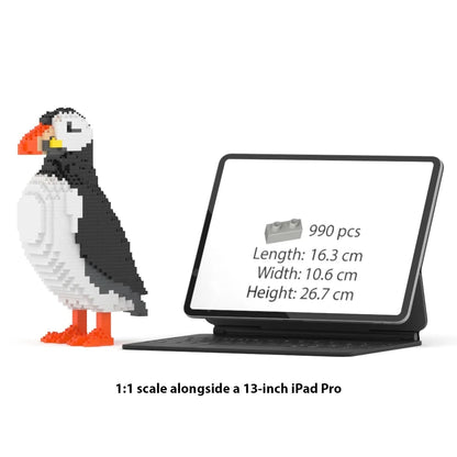 Model of a puffin next to a tablet displaying product details on a white background