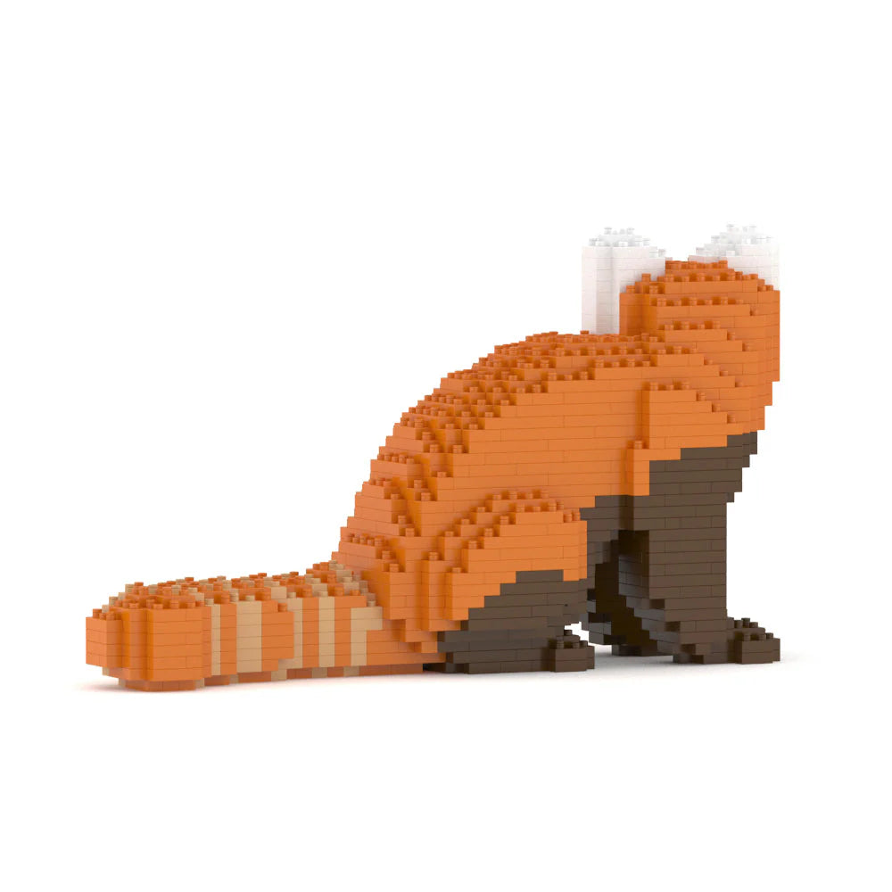 Toy figure of a red panda made from interlocking bricks on a white background