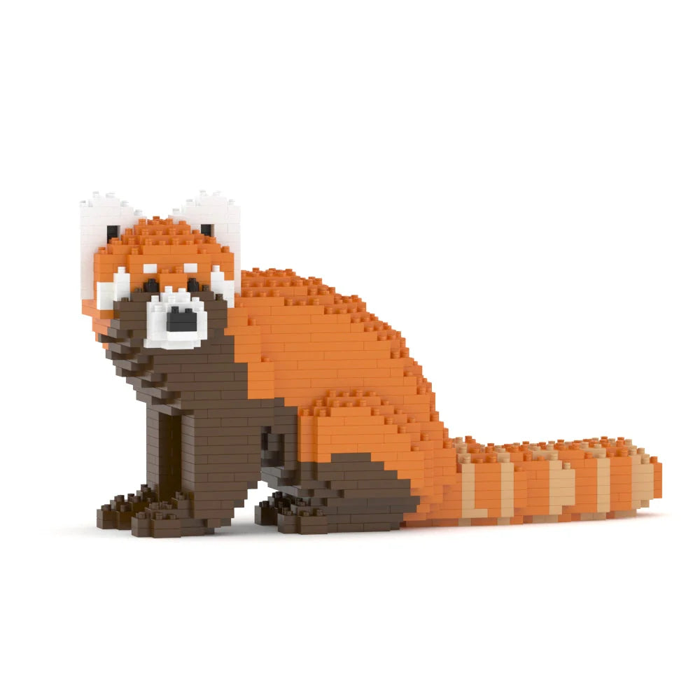 Toy figure of a red panda made from interlocking bricks on a white background