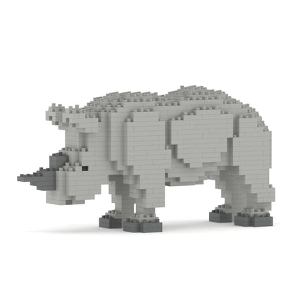 Gray rhino sculpture made of interlocking bricks on a white background