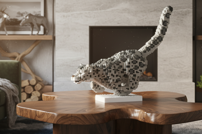 snow leopard made of interlocking blocks on the wooden table
