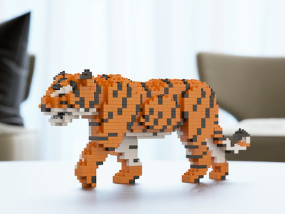 Toy tiger made of interlocking bricks on a white surface with a blurred background
