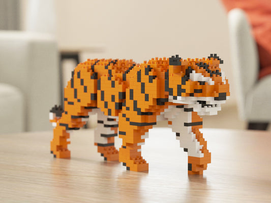 Toy tiger made of interlocking bricks on a wooden surface