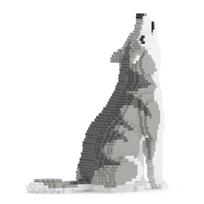 Gray wolf figurine made of small interlocking bricks on a white background