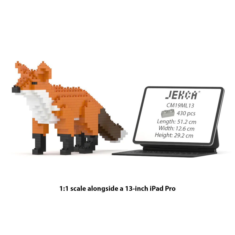 JEKCA Fox 1:1 scale building block sculpture standing next to a 13-inch iPad Pro for size reference.