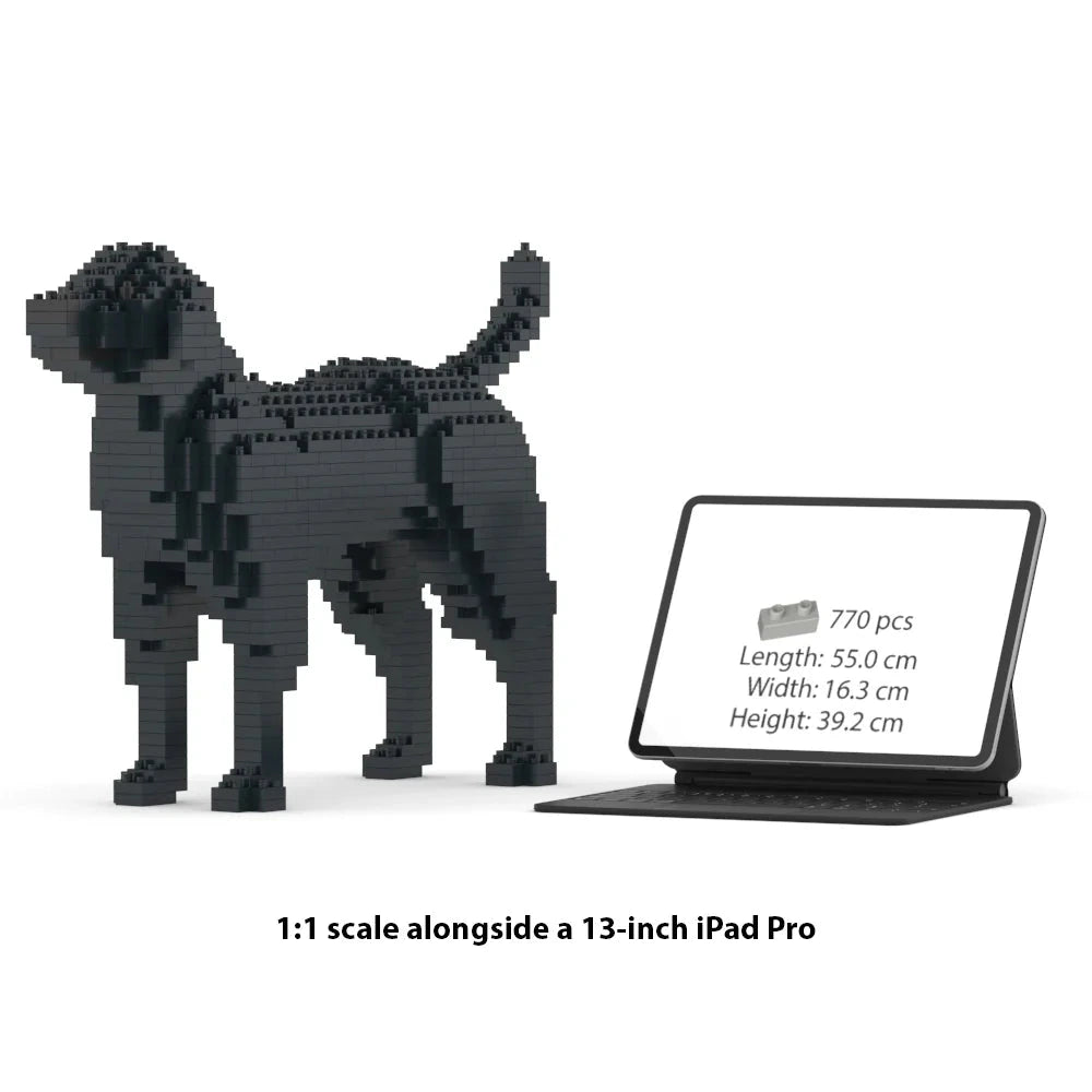 JEKCA Labrador Retriever building block model displayed next to 13-inch iPad Pro for scale comparison.
