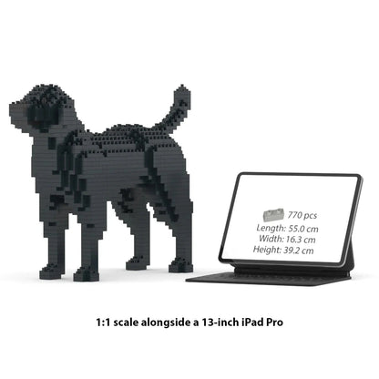 JEKCA Labrador Retriever building block model displayed next to 13-inch iPad Pro for scale comparison.
