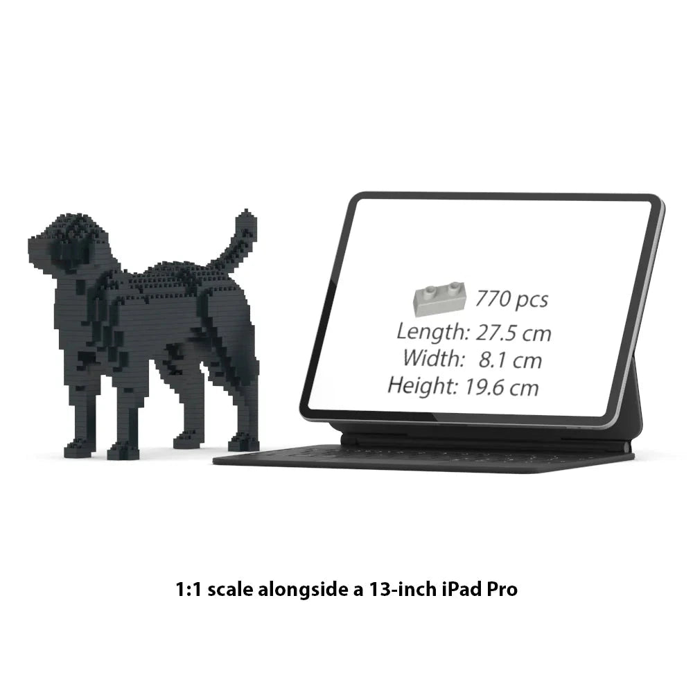 JEKCA Labrador Retriever building block model displayed next to 13-inch iPad Pro for scale comparison.