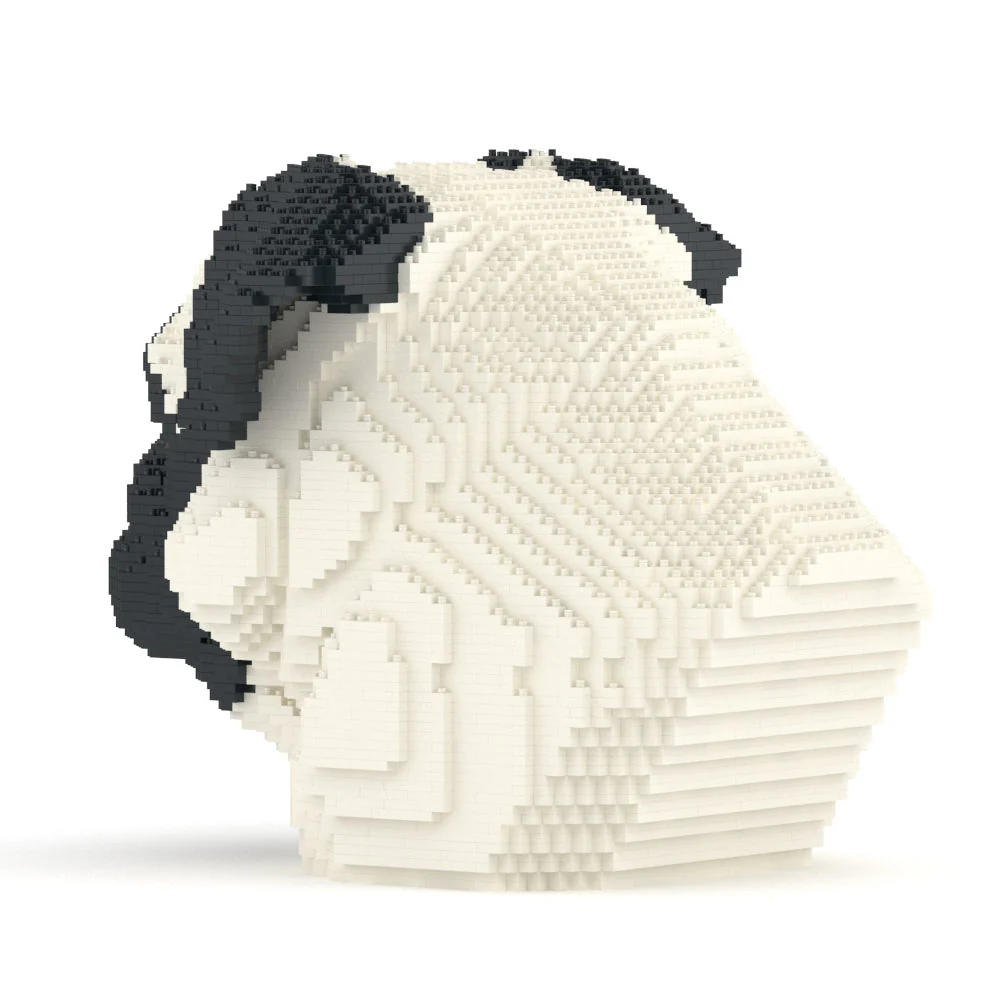White and black head sculpture made of interlocking bricks on a white background